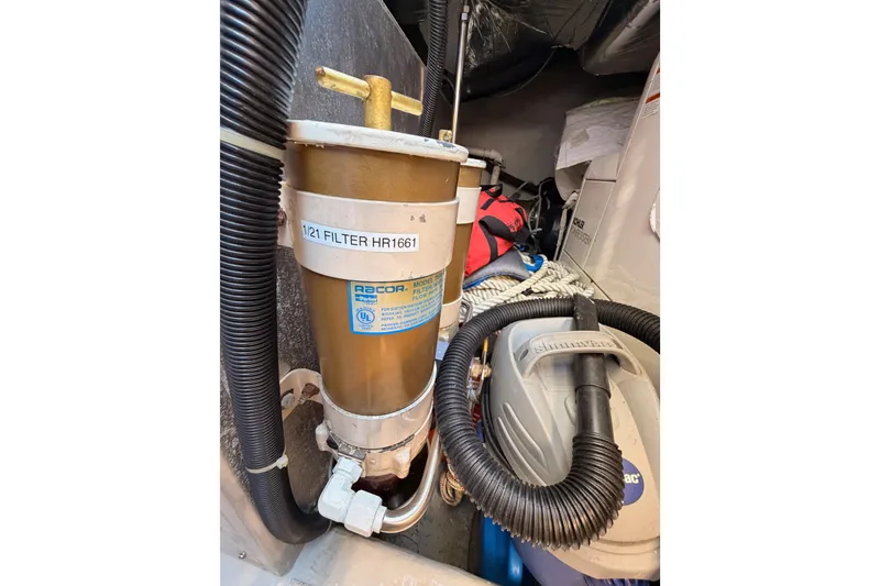 Slide: The Image of Racor fuel filter in 1999 Carver 530 Voyager Pilothouse engine room. - 130