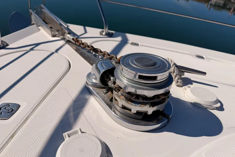 Slide: The Image of Anchor windlass on 1999 Carver 530 Voyager Pilothouse yacht deck. - 19