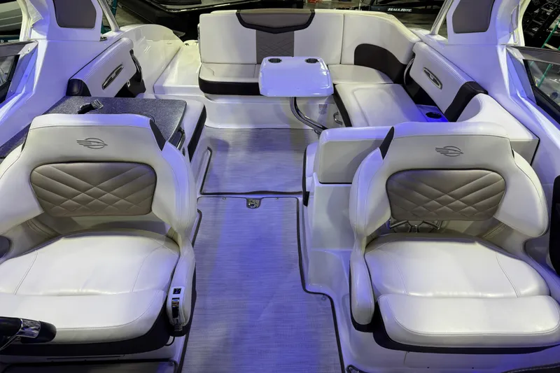 Slide: The Image of Luxurious interior of 2019 Chaparral 317 SSX boat with plush seating and modern design. - 10