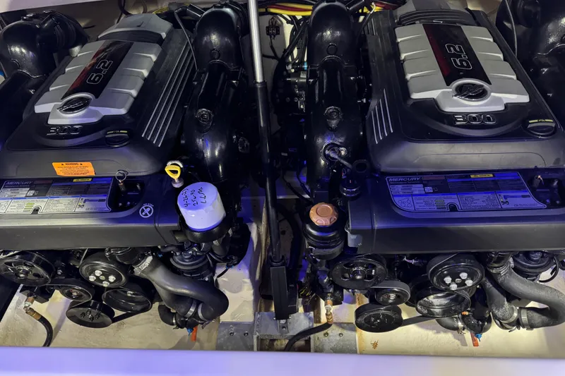 Slide: The Image of 2019 Chaparral 317 SSX boat on trailer in indoor showroom. - 16