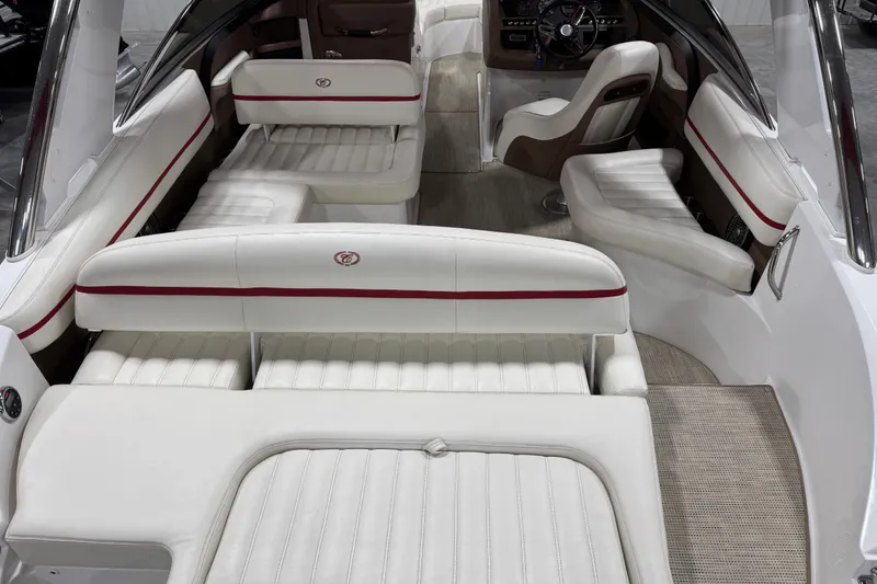 Slide: The Image of 2014 Cobalt R5 WSS boat in a warehouse, rear view with propeller and swim platform. - 6