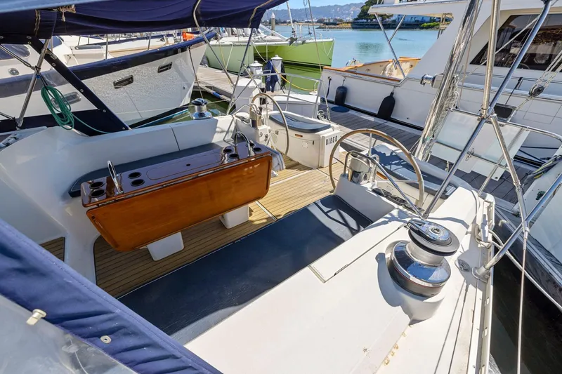 Slide: The Image of Cockpit of 2001 Jeanneau Sun Odyssey 52.2 sailboat docked at marina. - 14