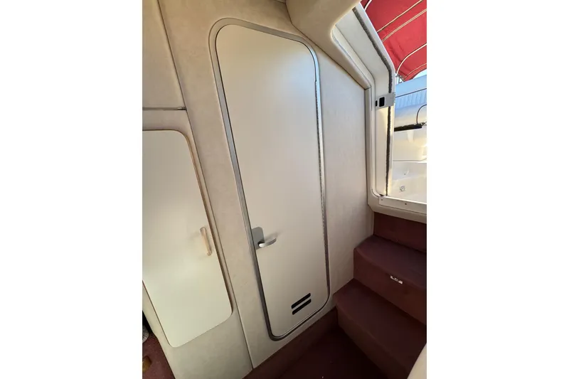 Slide: The Image of Interior cabin door and stairs of 1994 Sea Ray 270 Sundancer boat. - 4