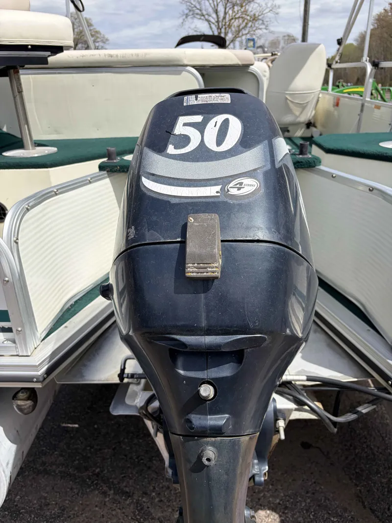 Slide: The Image of Outboard motor of a 1999 Lowe Suncruiser 22 boat, 50 HP. - 13