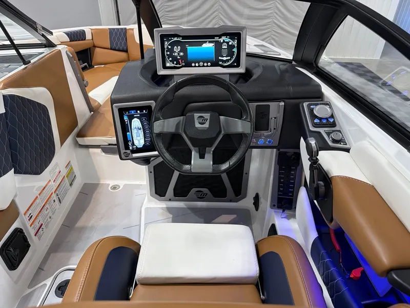 Slide: The Image of Interior of 2023 Malibu M220 with modern dashboard and controls. - 18