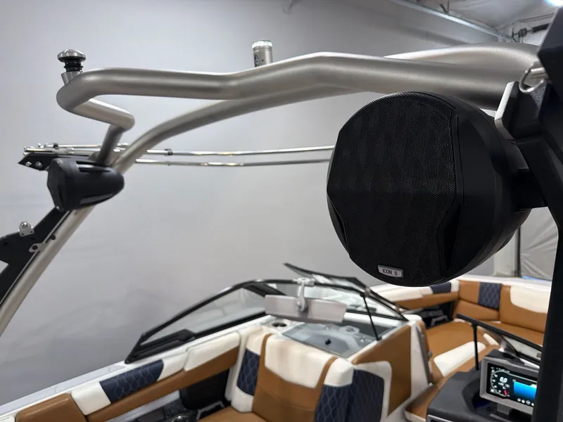 Slide: The Image of 2023 Malibu M220 boat with speaker and interior view. - 22