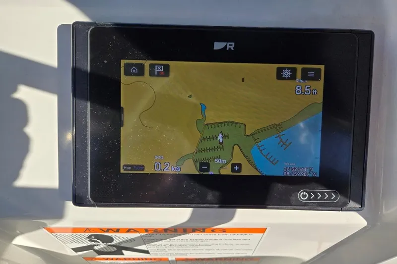 Slide: The Image of Navigation display on 2023 Beneteau Oceanis 38.1 sailboat, showing map and depth. - 21