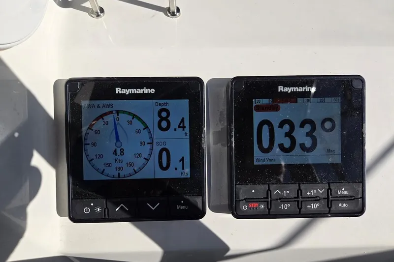 Slide: The Image of Raymarine instruments on 2023 Beneteau Oceanis 38.1 displaying depth and wind direction. - 25