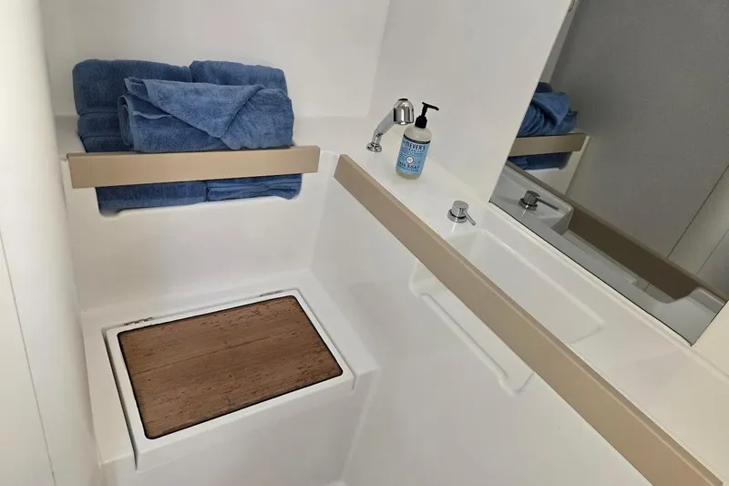 Slide: The Image of Bathroom interior of 2023 Beneteau Oceanis 38.1 yacht with towels and soap. - 59
