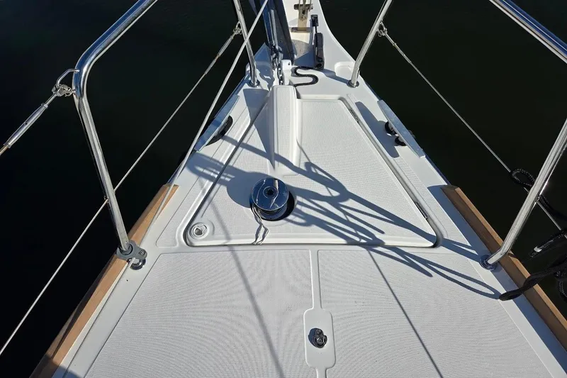 Slide: The Image of Deck view of 2023 Beneteau Oceanis 38.1 sailboat, featuring sleek design and stainless steel railings. - 72