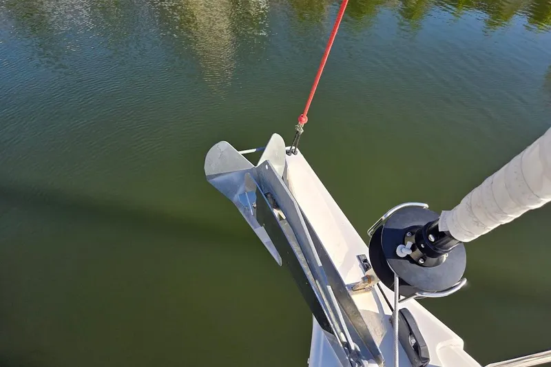 Slide: The Image of Beneteau Oceanis 38.1 sailboat bow with anchor and furler, 2023 model. - 73