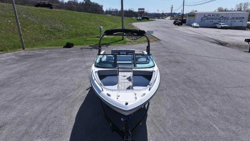 Slide: The Image of 2026 Chaparral SSX 4 boat on parking lot, front view. - 17