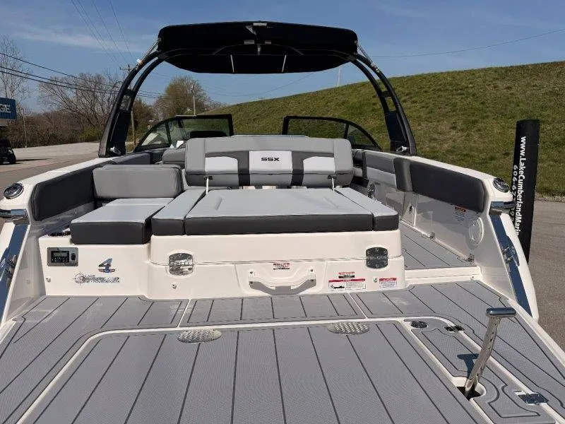 Slide: The Image of 2026 Chaparral SSX 4 boat with gray deck and seating area. - 34