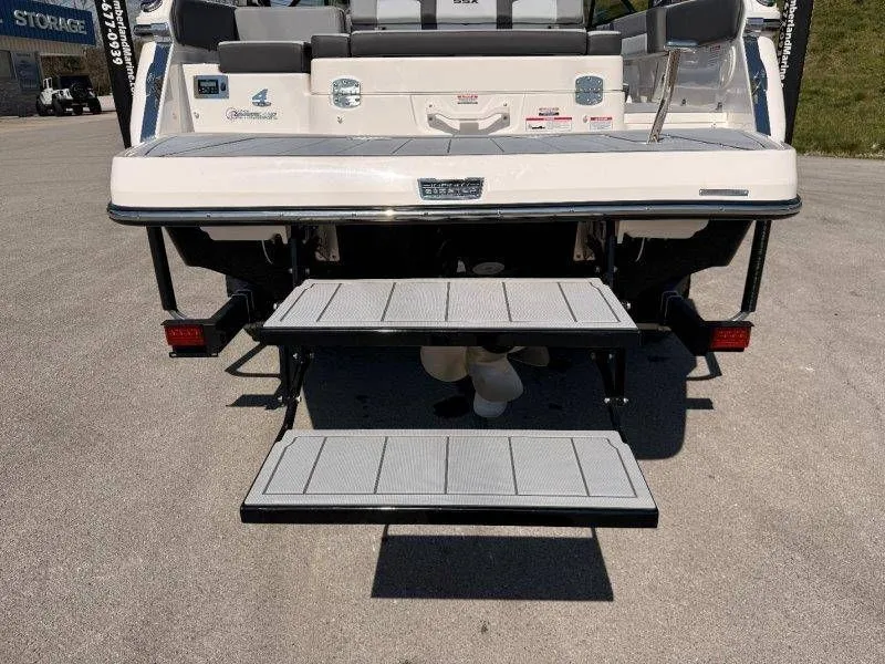 Slide: The Image of Rear view of 2026 Chaparral SSX 4 with fold-out swim platform. - 36