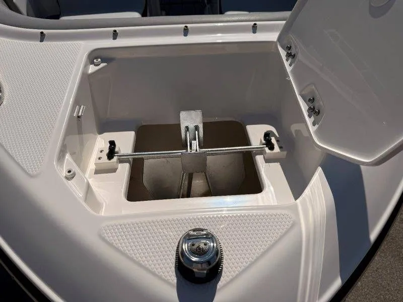 Slide: The Image of 2026 Chaparral SSX 4 anchor compartment with open lid. - 38