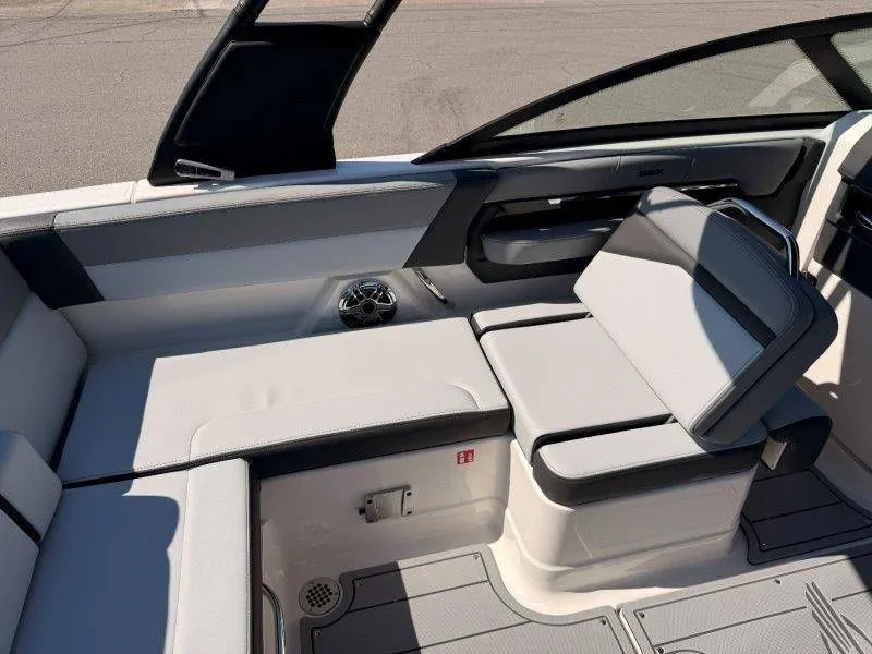 Slide: The Image of Interior of 2026 Chaparral SSX 4 boat with gray upholstery. - 48