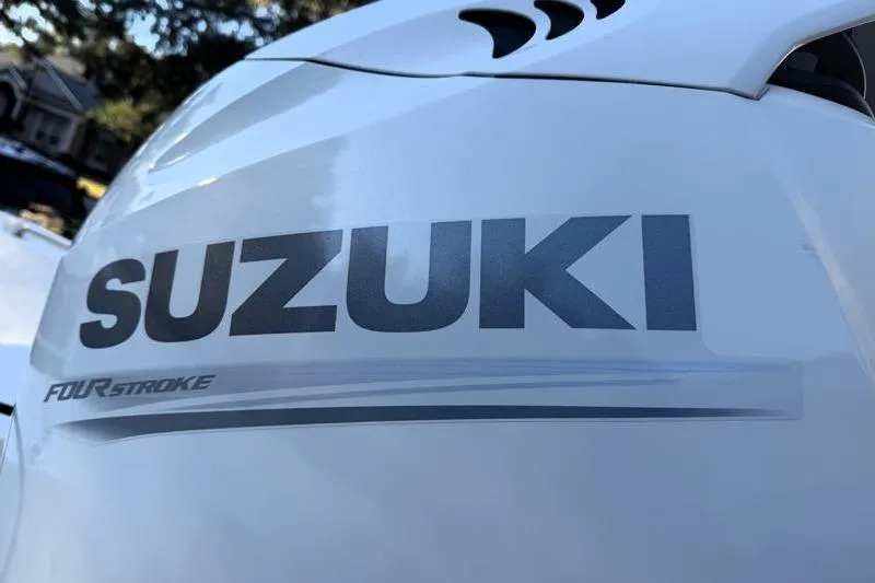 Slide: The Image of Close-up of Suzuki four-stroke engine on 2019 Bulls Bay 2000 boat. - 15