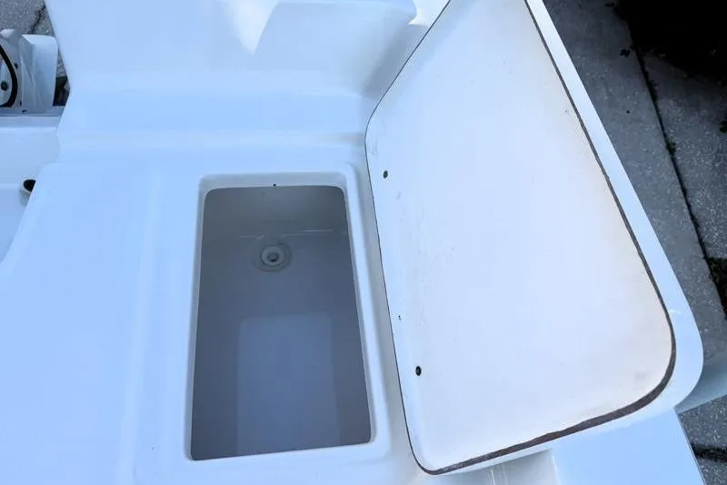 Slide: The Image of Open storage compartment on 2019 Bulls Bay 2000 boat deck. - 31