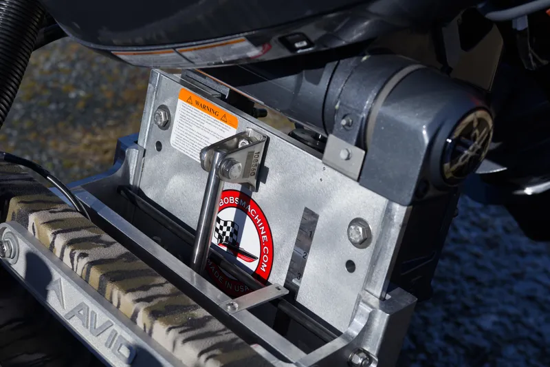 Slide: The Image of Avid 20 Rogue CC 2026 boat engine detail with warning label and branding. - 10