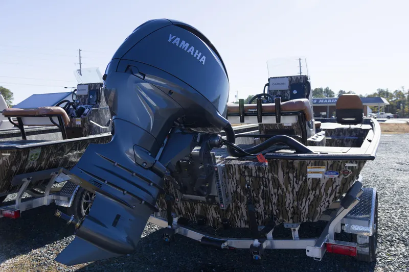 Slide: The Image of 2026 Avid 20 Rogue CC boat with Yamaha outboard motor on a trailer. - 13