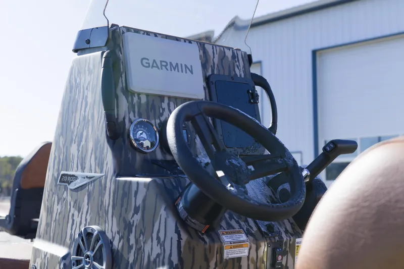 Slide: The Image of Avid 20 Rogue CC 2026 boat console with Garmin navigation system. - 4