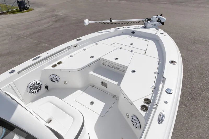 Slide: The Image of 2024 Crevalle 26 HCO boat deck with storage compartments and speakers. - 1