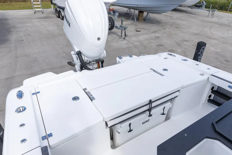 Slide: The Image of 2024 Crevalle 26 HCO boat with Yamaha outboard motor, featuring spacious deck and storage. - 15