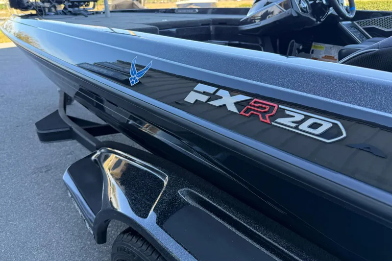 Slide: The Image of 2023 Skeeter FXR20 Select boat, sleek design, close-up view of logo and detailing. - 4