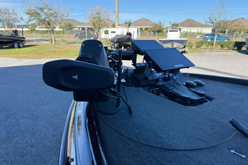 Slide: The Image of 2023 Skeeter FXR20 Select boat with advanced navigation equipment on deck. - 7