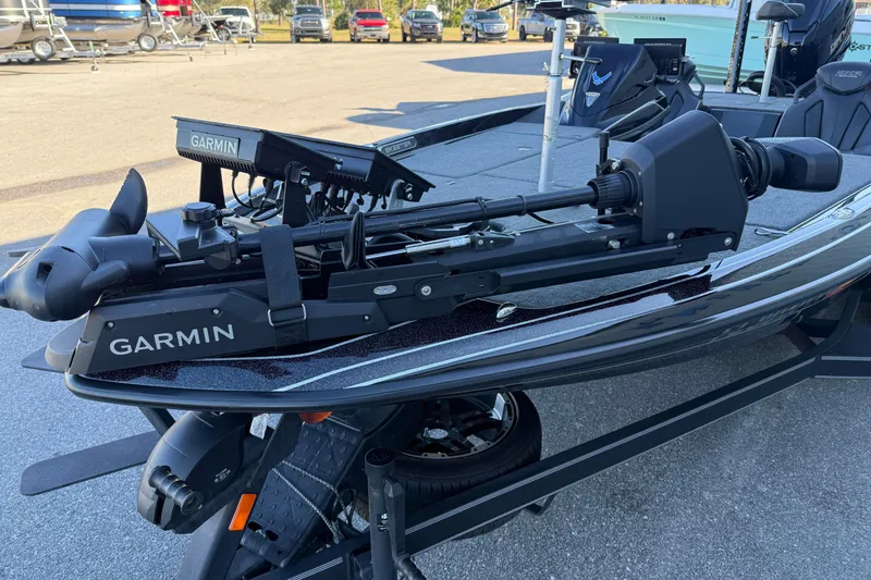Slide: The Image of 2023 Skeeter FXR20 Select boat with Garmin trolling motor on trailer. - 8