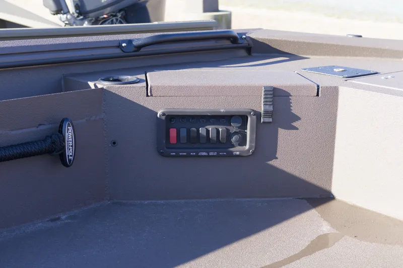 Slide: The Image of Control panel on 2026 Avid 16 Commander boat, featuring Power-Pole switch. - 7