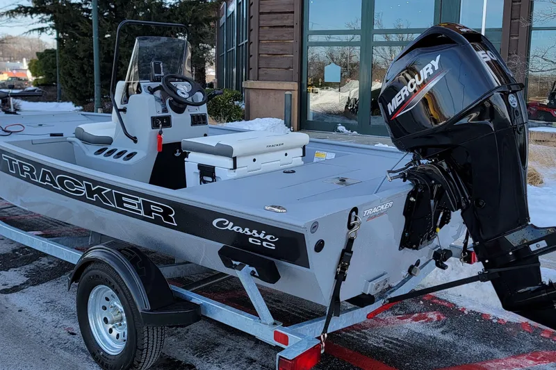 Slide: The Image of 2026 Tracker Bass Tracker Classic CC boat with Mercury engine on trailer. - 2