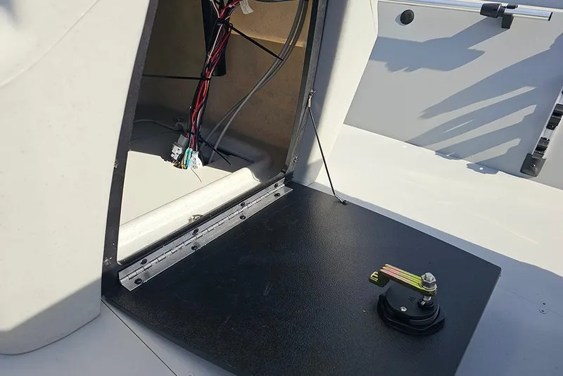 Slide: The Image of 2026 Tracker Bass Tracker Classic CC boat interior wiring and compartment view. - 14