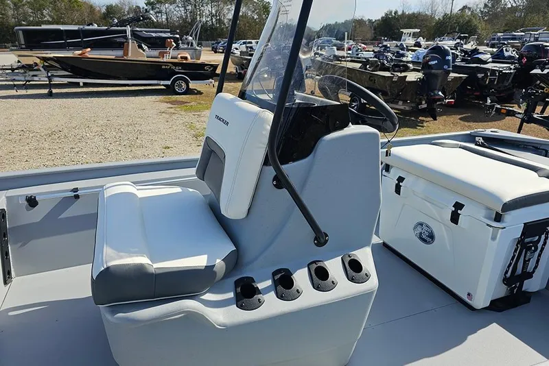 Slide: The Image of 2026 Tracker Bass Tracker Classic CC boat interior with seating and console. - 15