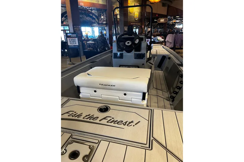 Slide: The Image of 2026 Tracker Bass Tracker Classic CC boat interior with "Fish the Finest!" text. - 7