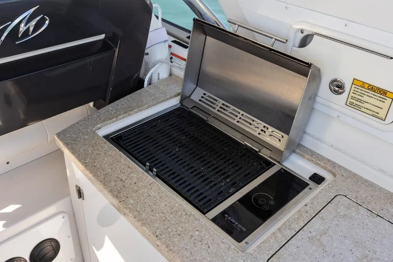 Slide: The Image of Outdoor grill on 2012 Monterey 400 Sport Yacht, featuring a sleek countertop design. - 10