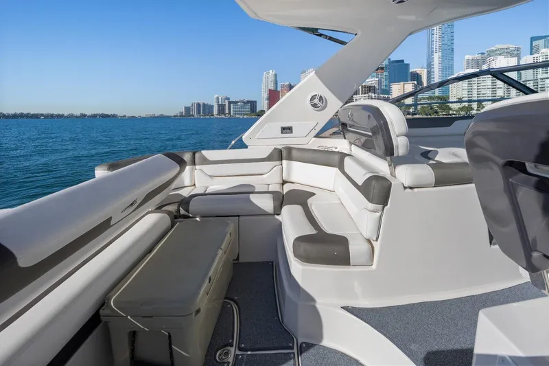 Slide: The Image of 2012 Monterey 400 Sport Yacht interior with city skyline and ocean view. - 14