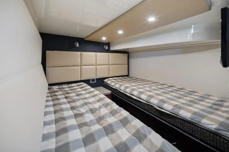Slide: The Image of Interior cabin of 2012 Monterey 400 Sport Yacht with twin beds and modern lighting. - 27