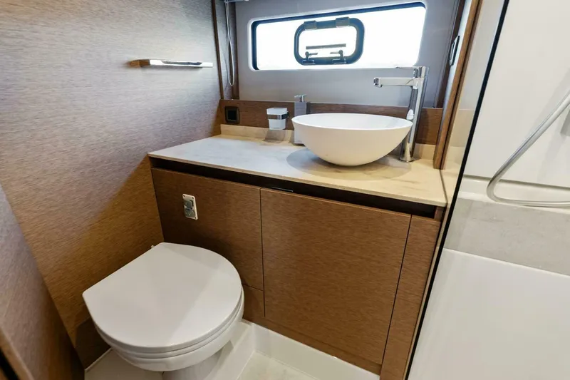 Slide: The Image of 2024 42 Prestige Flybridge - Master Stateroom Head - 24