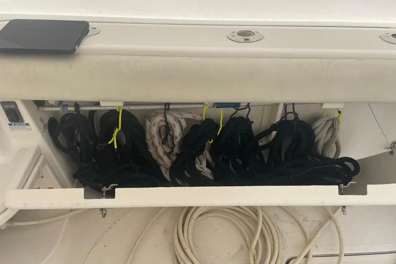 Slide: The Image of Storage compartment with ropes on a 2006 Tiara Yachts 3800 Open. - 24