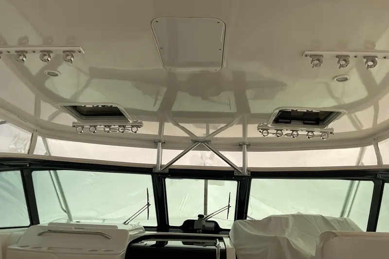 Slide: The Image of Engine compartment of a 2006 Tiara Yachts 3800 Open, showcasing detailed mechanical components. - 37