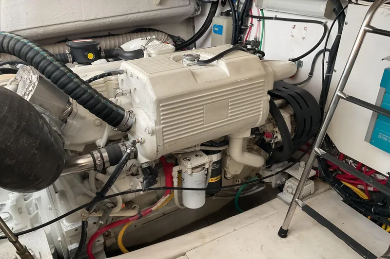 Slide: The Image of Engine room of 2006 Tiara Yachts 3800 Open, showcasing detailed mechanical components. - 40