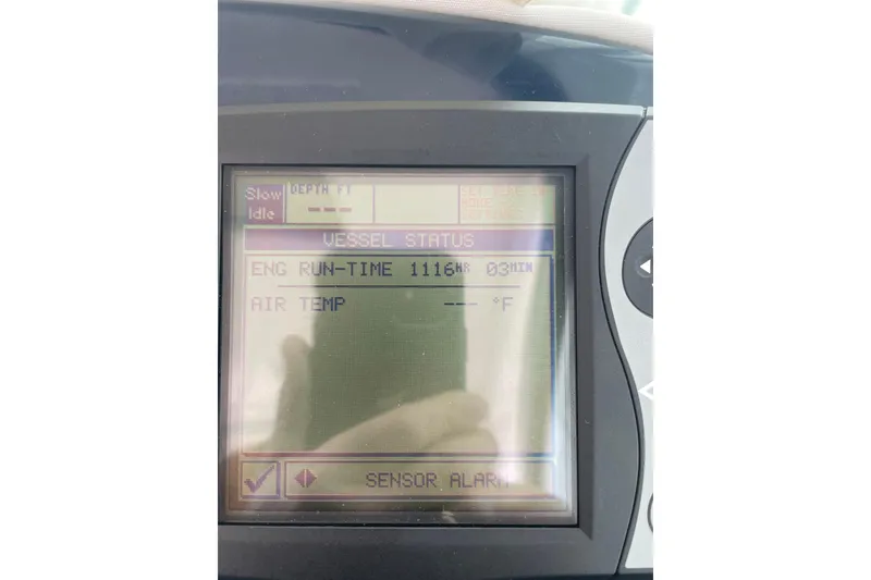 Slide: The Image of 2006 Tiara Yachts 3800 Open interior with kitchen, stairs, and seating area. - 7