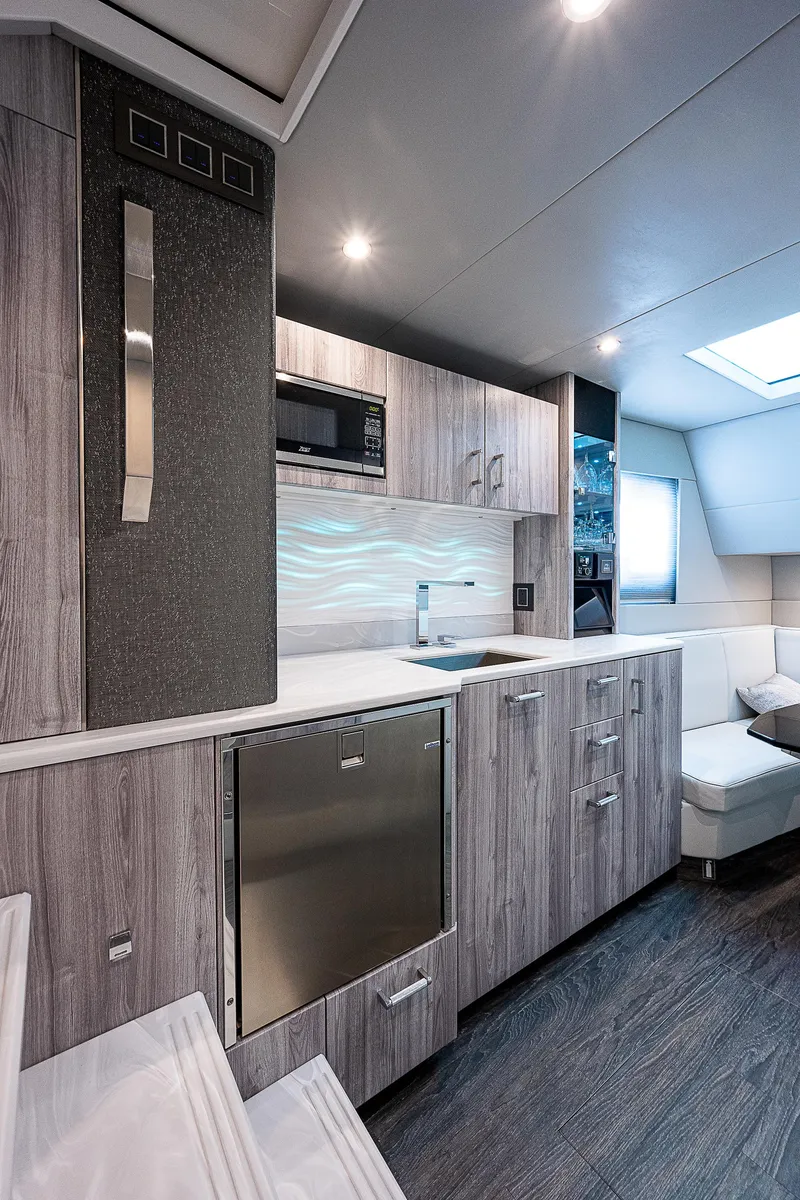 Slide: The Image of Modern kitchen interior in 2022 Formula 500 Super Sport Crossover yacht. - 27