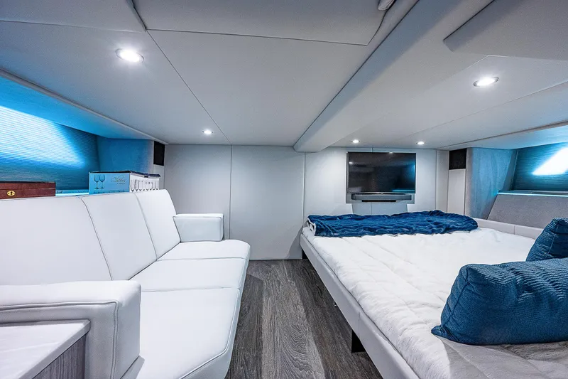 Slide: The Image of Luxurious interior of 2022 Formula 500 Super Sport Crossover with modern seating and bedding. - 29