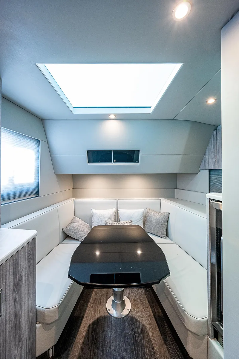 Slide: The Image of Luxurious interior of 2022 Formula 500 Super Sport Crossover with skylight and modern seating. - 4