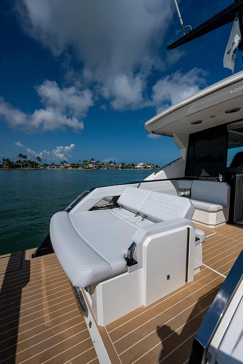 Slide: The Image of 2022 Formula 500 Super Sport Crossover yacht with luxurious seating on deck. - 40