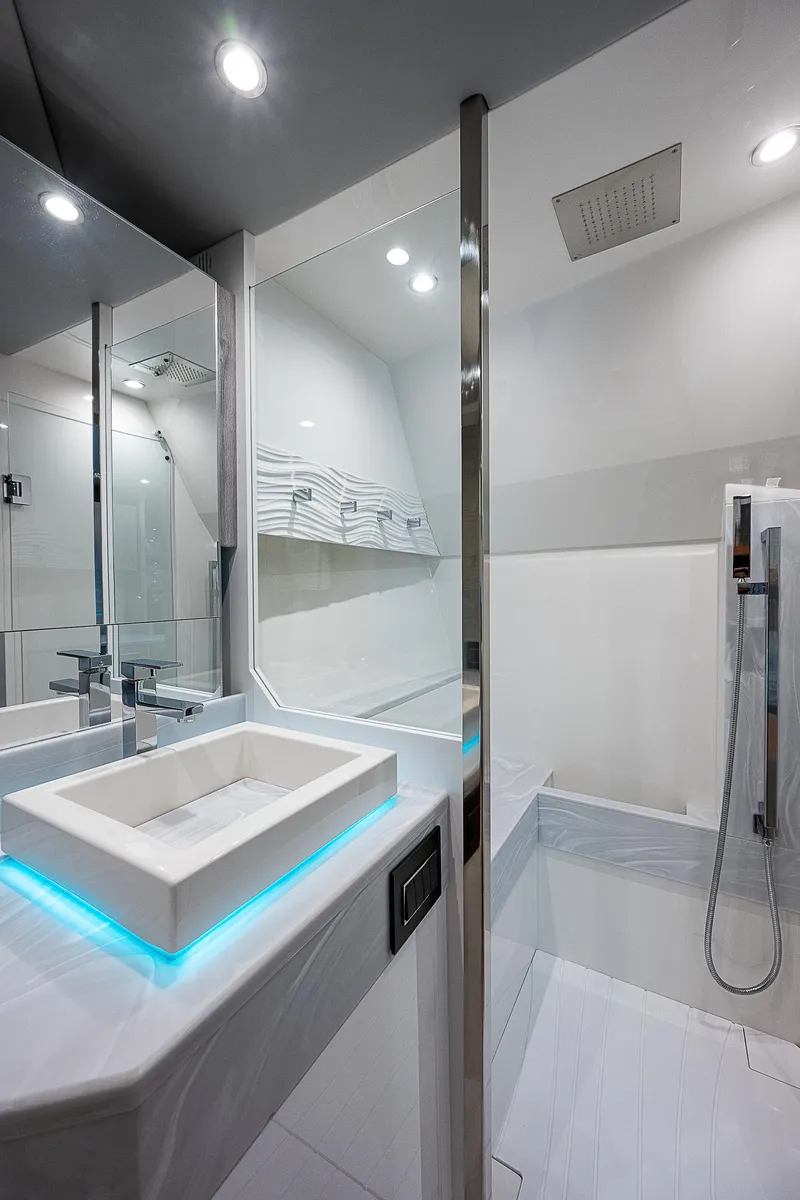 Slide: The Image of Modern bathroom in 2022 Formula 500 Super Sport Crossover yacht, featuring sleek design and ambient lighting. - 7