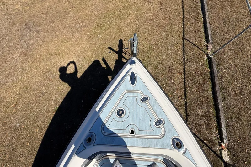 Slide: The Image of Top view of 2003 Glasstream 273 SCX boat on dry land with shadow. - 116