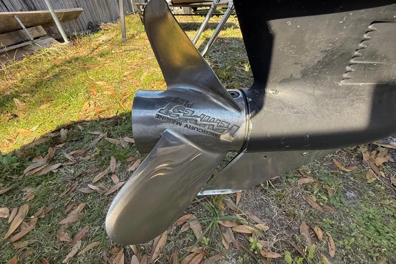 Slide: The Image of Close-up of a Mercury Marine propeller on a 2003 Glasstream 273 SCX boat. - 127